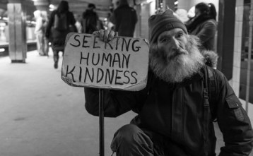 beggar seeking human kindness