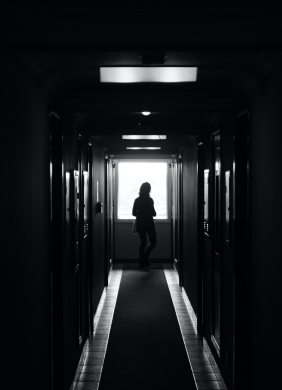 Person in dark hall