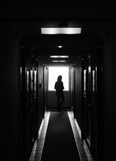 Person in dark hall